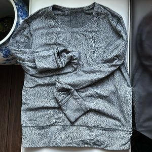 Lululemon long sleeve running top; zip pocket; fold over cuffs  4